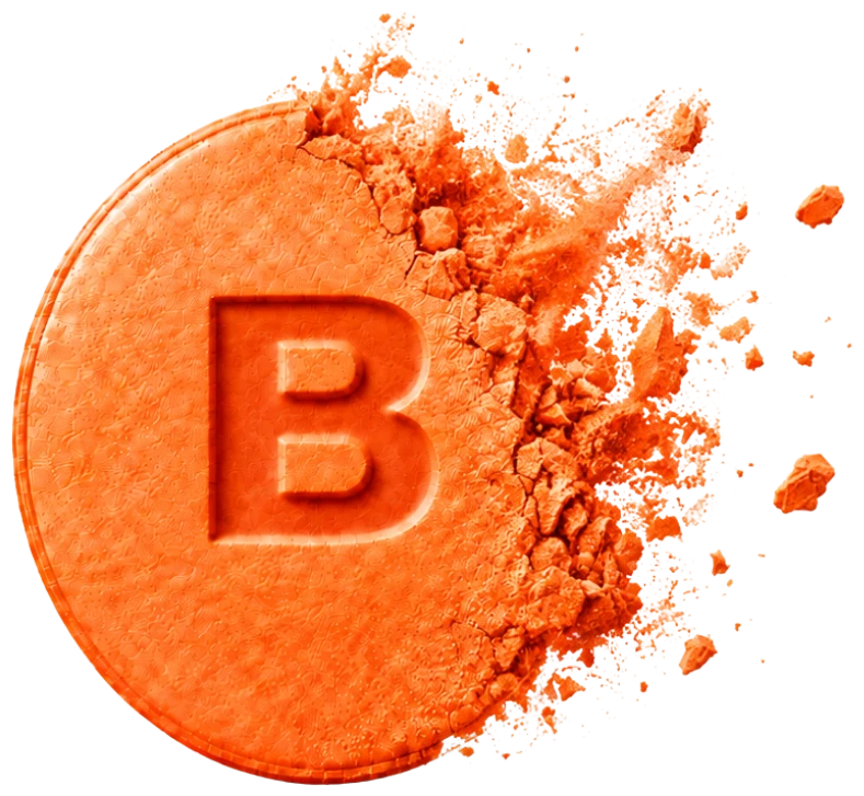 Orange Bricked tablet with a B pressed into it, crumbling apart on one side